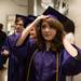 Claudia Lahr fixes her cap as the soon-to-be graduates line up before the start Pioneer's class of 2013 graduation ceremony at EMU's Convocation Center Thursday, June 6.
Courtney Sacco I AnnArbor.com 